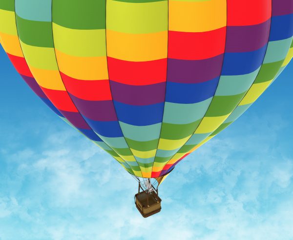 Picture of hot air balloon against a deep blue sky